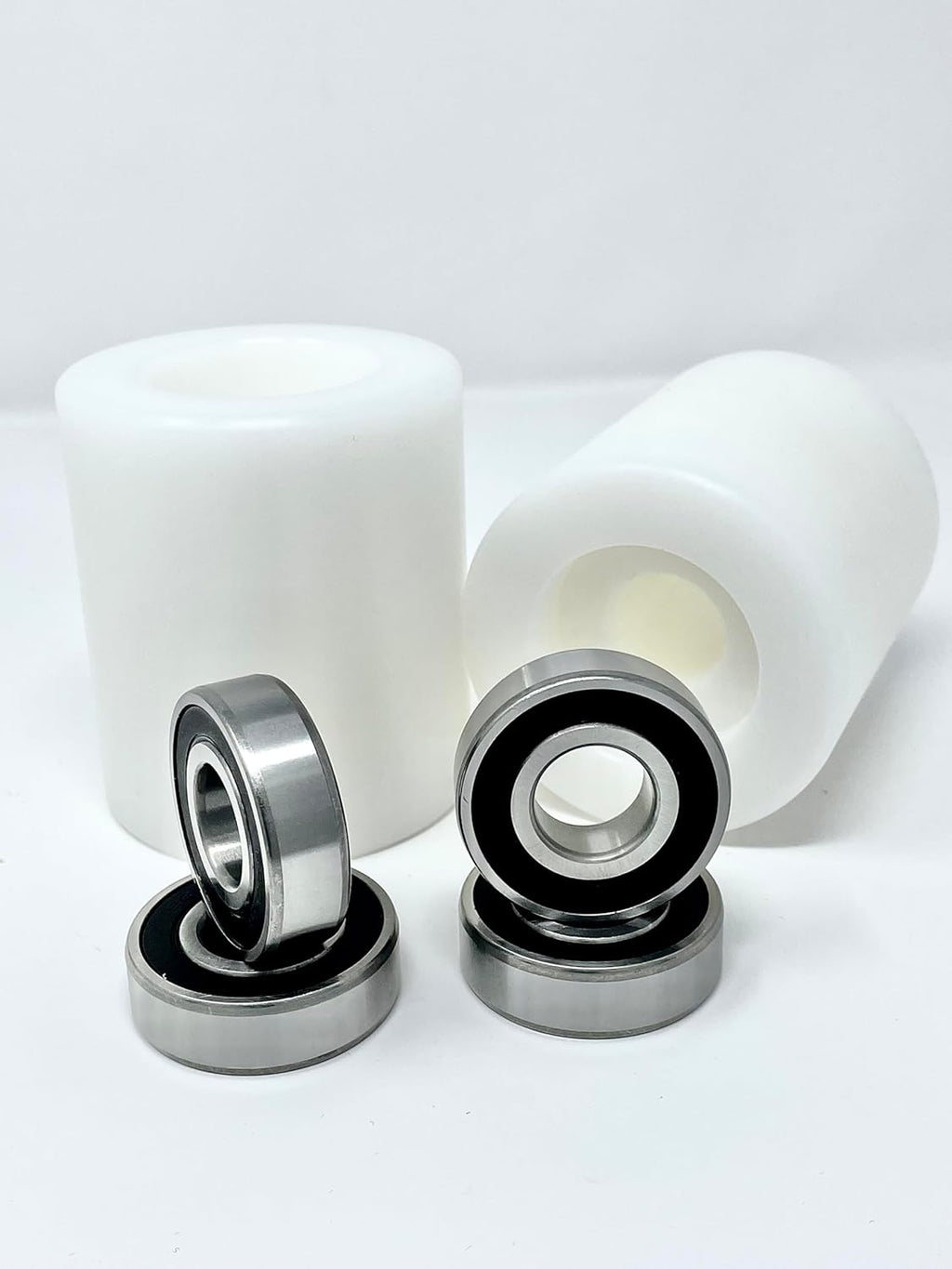 Pallet Truck Load Rollers 93mm x 80mm UHMWPE Wheels with Sealed Bearings (Pair) - Warehouse Equip UK