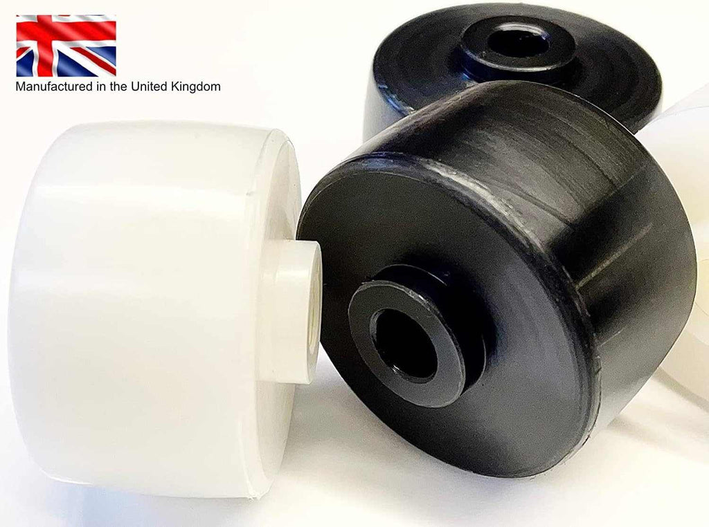 Pair of black CNC machined entry wheels for BT Rolatruc LHM230 pallet truck made from high-impact engineering plastic